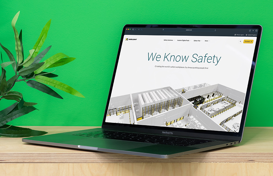 Axelent website laptop mockup on wooden bench