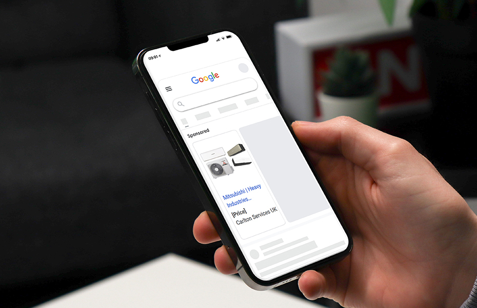 Handheld mobile mockup of Google Ads for Carlton