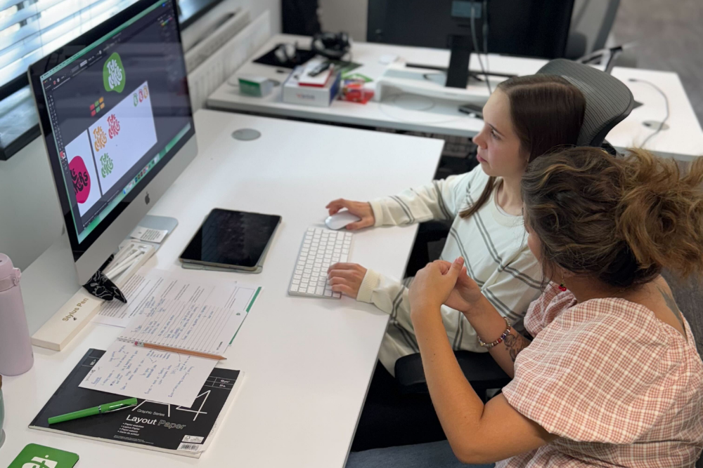 two women at a desk